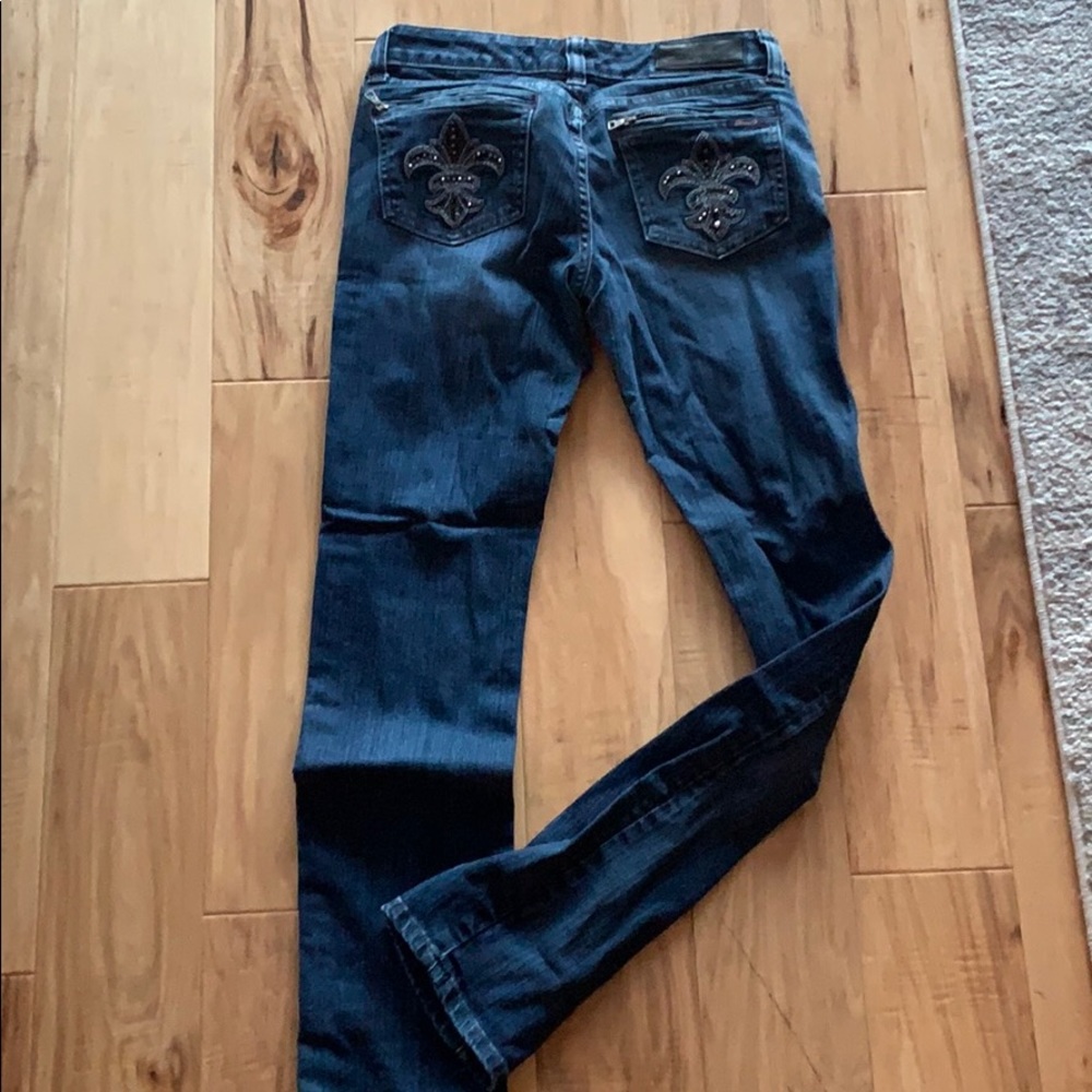 Straight, low-rise Seven Blue Jeans with gems on pockets